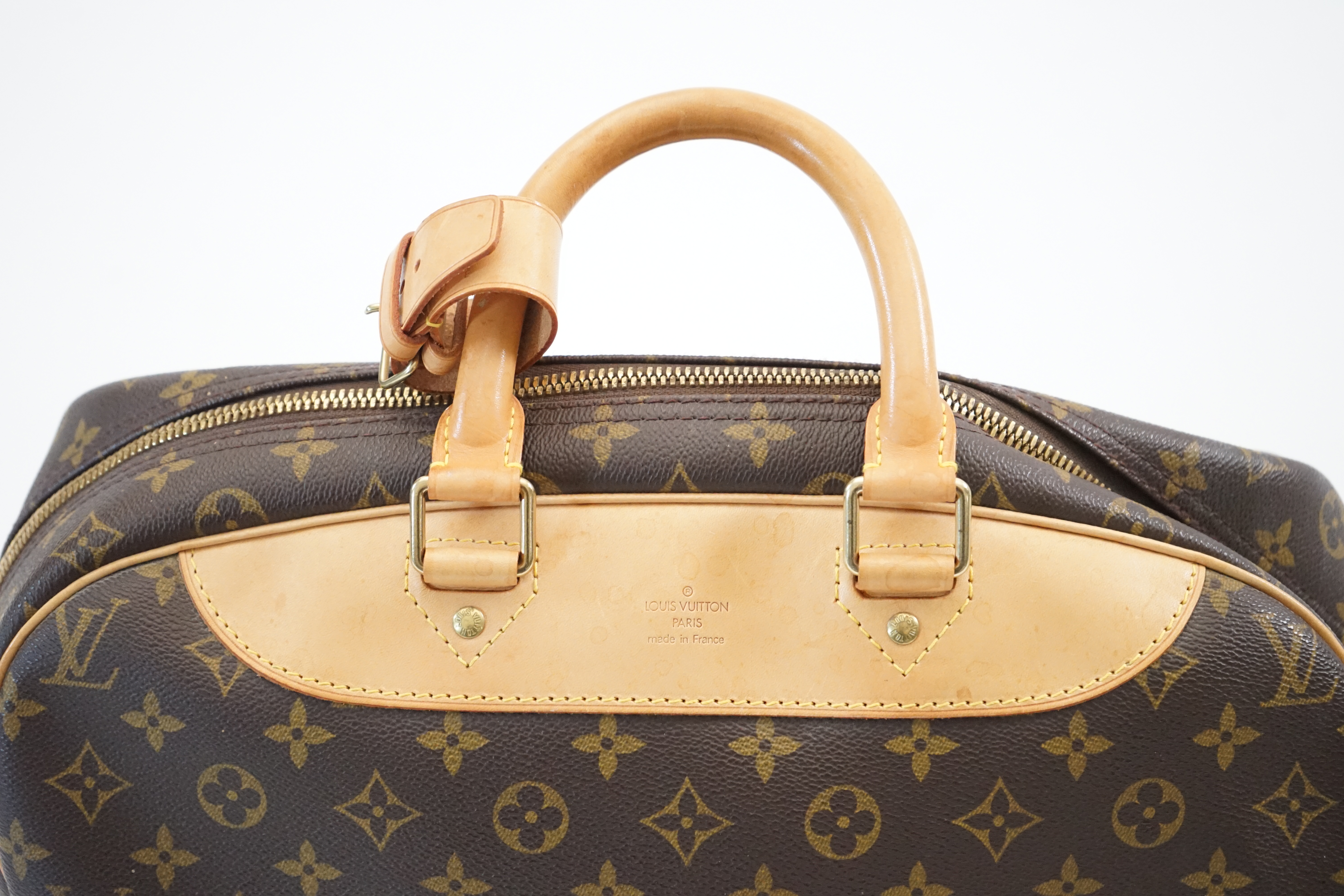 A Louis Vuitton Evasion travel bag width 38cm, depth 23cm, length 33cm, hand drop 12cm